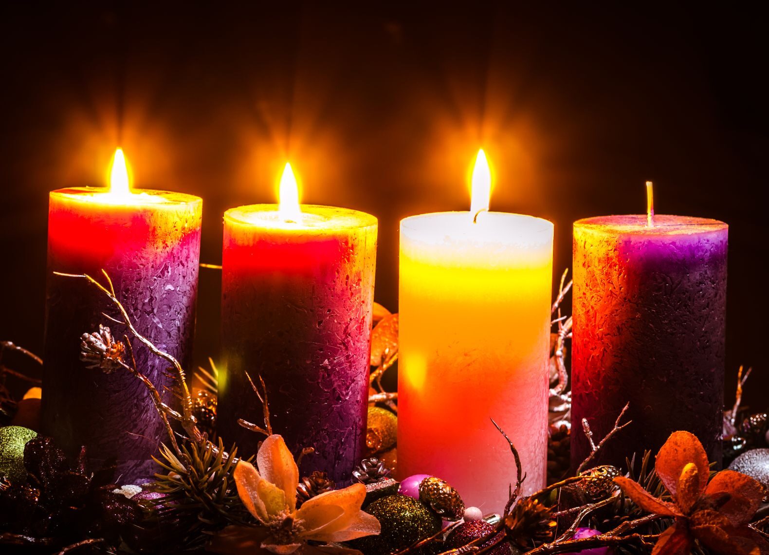 advent decoration with three burning candles
