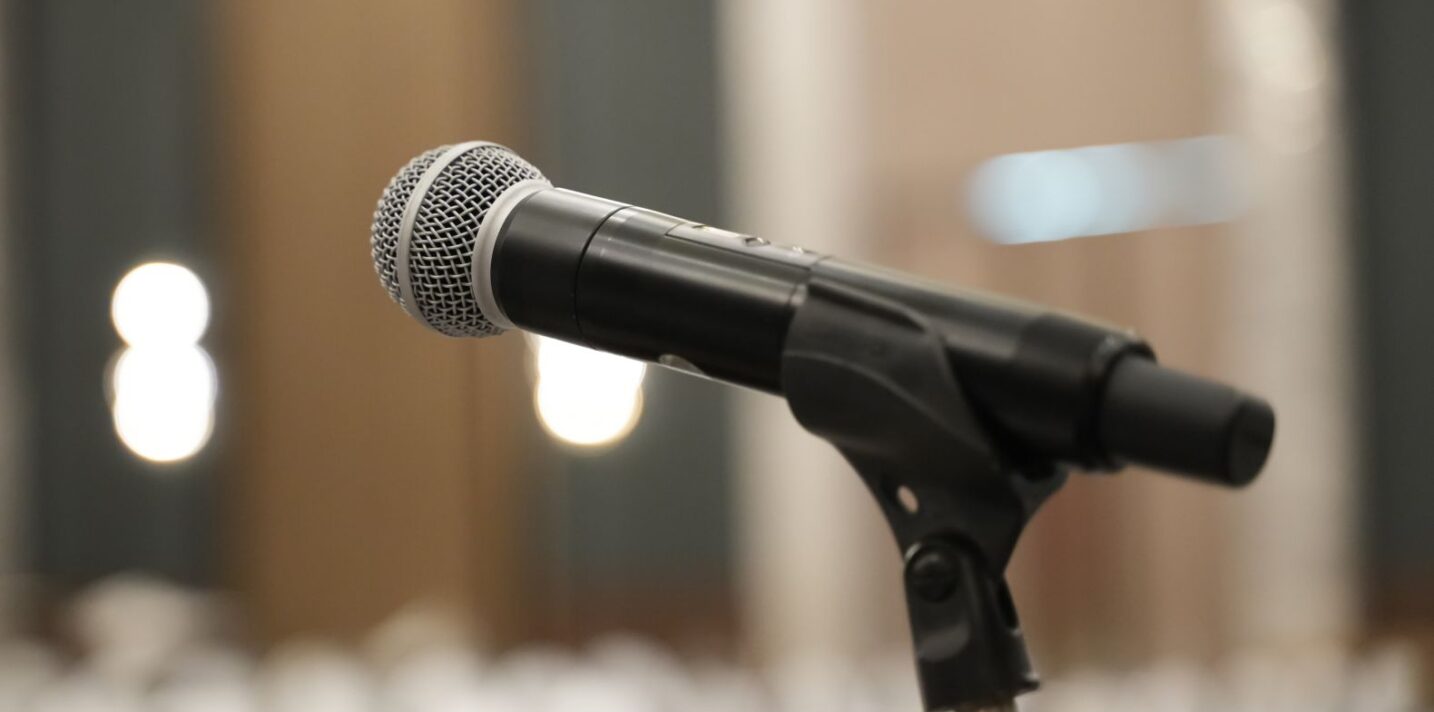 Microphone close up on stage for Organizing training seminars.