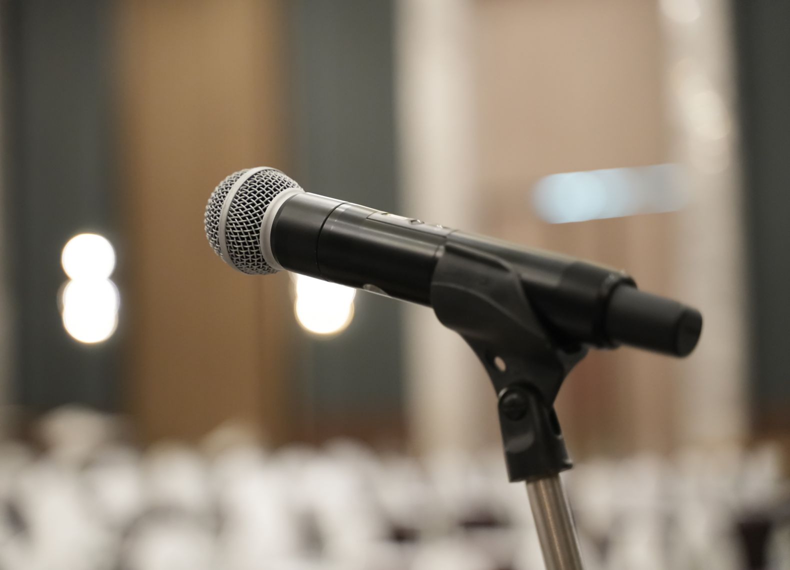 Microphone close up on stage for Organizing training seminars.