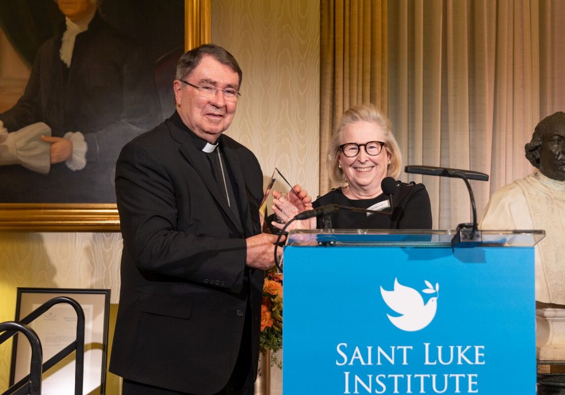 Chair of the Saint Luke Institute Board of Directors, Christine M. Gill, Esq., presents the Saint Luke Award to our host and honoree Christophe Cardinal Pierre at our 2024 Annual Benefit.