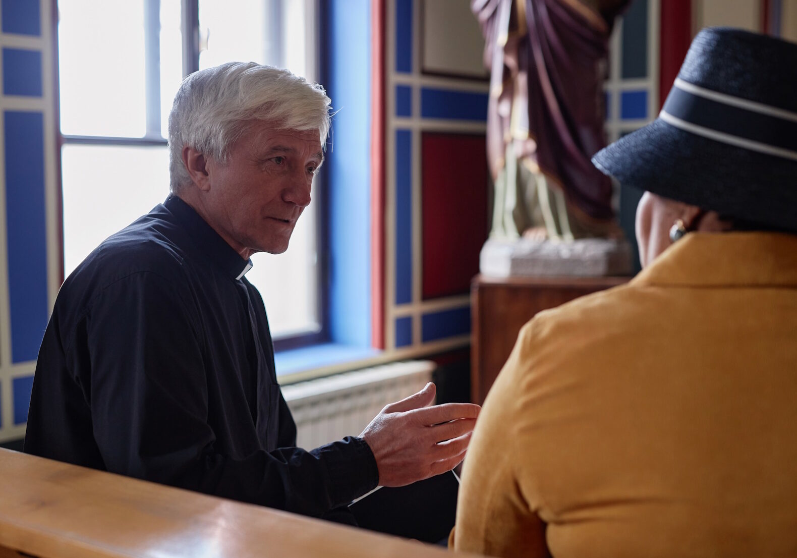 Senior priest discussing christian moments with woman while they sitting on bench in church SSUCv3H4sIAAAAAAAACpxUyW7cMAy9F+g/BDpHgPalv1L0oM0ZIx5r4CVFEOTfS9sjj5xMcujFMB/JZ/KZ5NvPHw8PyLuxDejXw9tigd123TxOg5va3ANMHq/4kPqYhhp5GbgiNeDa2kqxnfLQuq4GvZvCqXfnBGA/d90Cv69ONE5umsc0VrVQxocGbF7SL6c85Tj3qQZdzD6NUw7Ph9DcR1kDcUjuPE7t+ZjcufNrDYyneZrSsPNVFQY3pSdo6VBj0e/3Zj8Ux+qEDHAhdCXfPjD7FSvQRv5fmdvLn72Xp9SHpZmd6KjNXuIiLRFG7UyF4qNMdQYj7F58EbAO5UEpY5zHjQ4Bi9AQbJRK2FIKnsSIb8iNa3t5r4QeUpfcNgpXWkS8SMJTiZsmeiw4EdgJlnDjQ2RERmkILWKhqL11nnpMmIfg5AK2DRVYUhGMdNEJofbgpLULUlsMDRII1gRbC2+G+mSF4SY0ei12axo9/4XxOK8jcC3XzbHN1Ui85OC68cPwXIY2tP1TlZan07pQJS3kuZ+G1/q3oy7ni/Pd8i8a4EwFP7lxhPBY8HpKYX3zufpOn6dVyisrijDGi0k5Z8pqbSnTVlllBKo38dQCz1pOKXC+dNnFFA8TVnaUKkO1FFTZx/vTtwRYKoRlt4CypFefJOKLQdwD9OfJKz5advjzFkMIk4QTbq/Dtm/77M8tRB57qs/M1pdhRj3e7RnUE1x+VZUiVn7XEtOSfS+YEnVfR8GUqfW427OgpPR8uLUQ08b6jtU9o0hSkLYJWKXosGCOYa/A1ISawIMRhLF9RosaaEwvqZ9emzwPWjBYUUI0uS1aUQYF7YFXSuyYb4BdUOyFjJiFlIJJ8LS3rINmCPTiUgnCb6y1ZEhawRmh0uz+ohhi3FjGtbmdiQ+CIcYstwwOiV33/apVu8wGClY66oKGcuEICbg42GoPR4iIRkaluFINZL3/AwAA//8DAAv0COBVBwAA