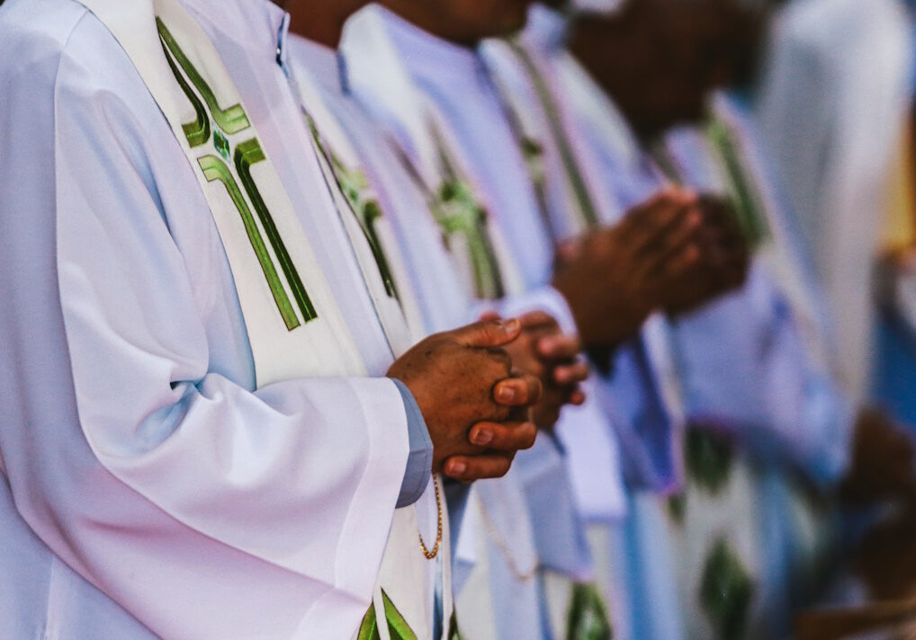 Hands of the priest during the celebration of the Holy Communion.