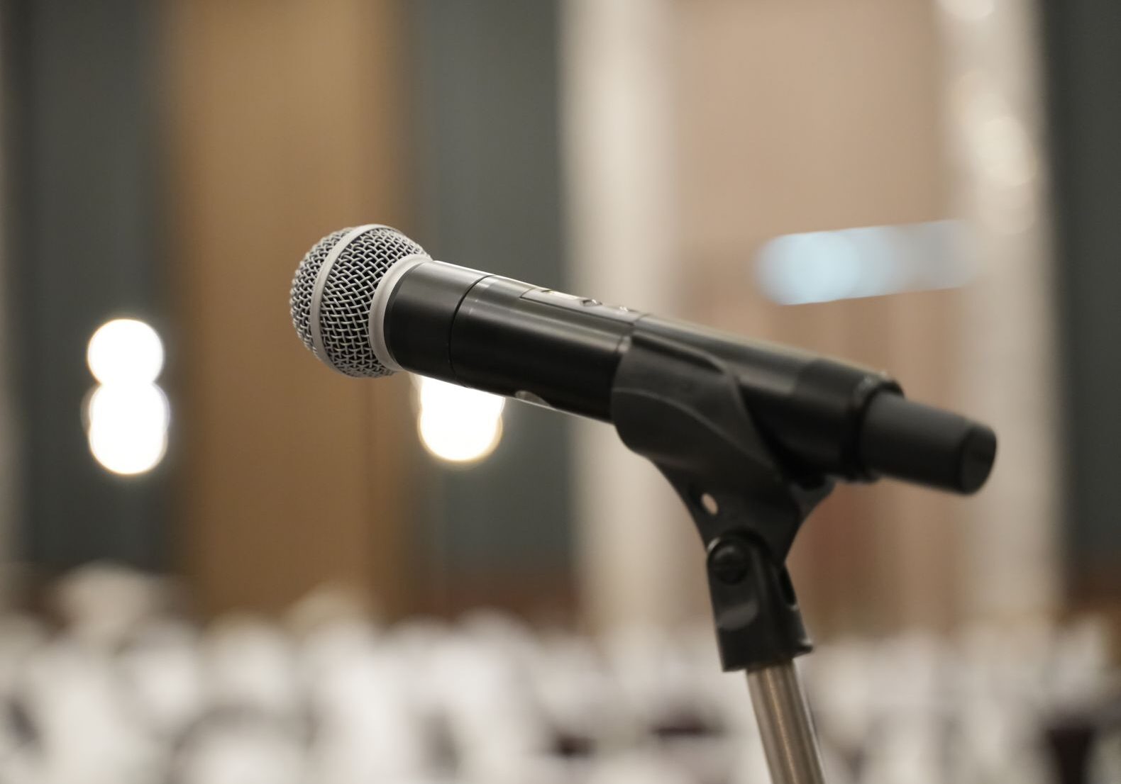 Microphone close up on stage for Organizing training seminars.